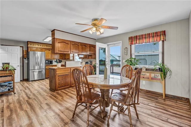19890 State Highway C, Pattonsburg, MO 64670 - dining area featuring light wood-style floors, ceiling fan, and baseboards