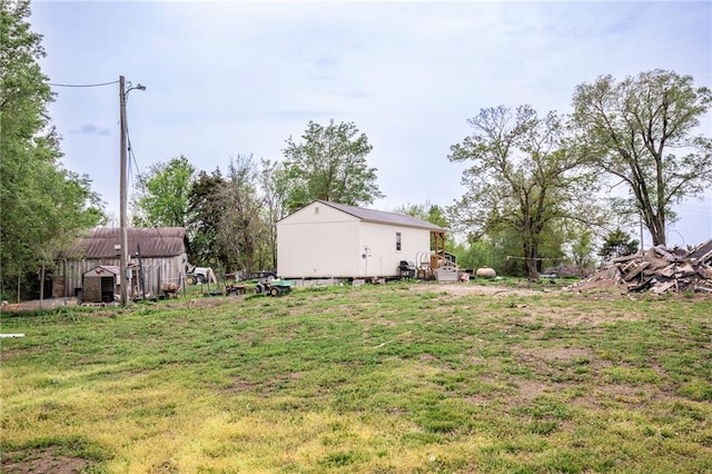 5971 Montgomery Rd, Mound City, KS 66056 - view of yard with an outbuilding
