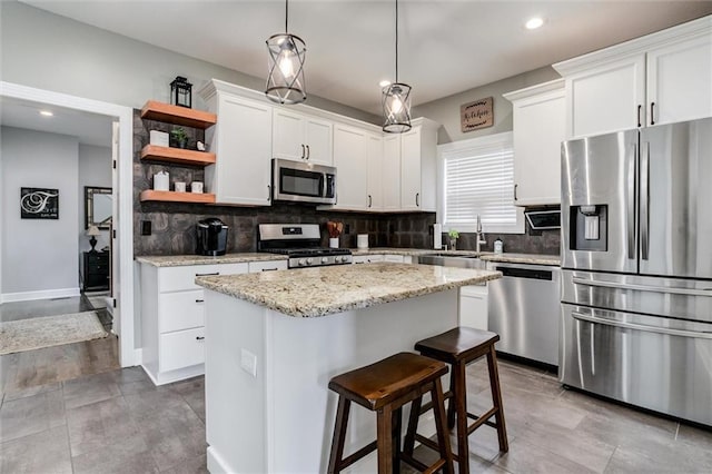 925 SW Ovation Dr, Lees Summit, MO 64081 - kitchen with a sink, decorative backsplash, open shelves, and stainless steel appliances