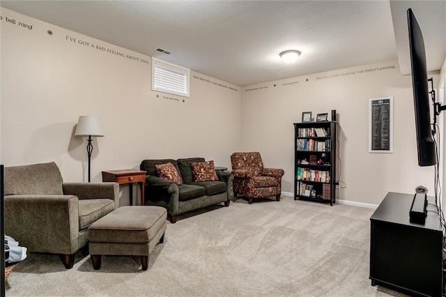 925 SW Ovation Dr, Lees Summit, MO 64081 - living area featuring baseboards, visible vents, and light carpet