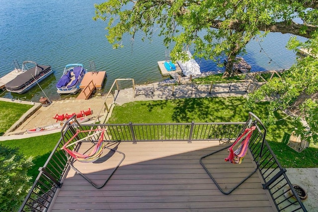 exterior space featuring a water view and a boat dock