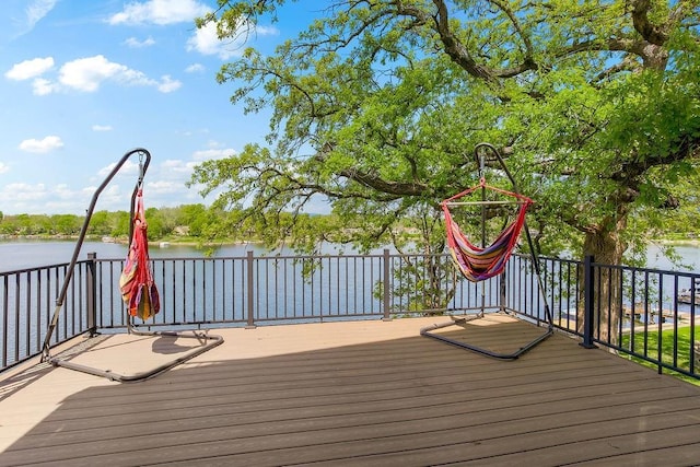 deck featuring a water view