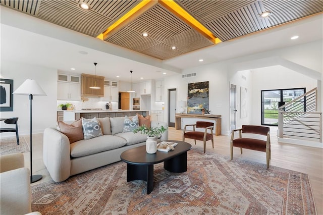 10675 W 142nd Ter, Overland Park, KS 66221 - living area featuring recessed lighting and stairway