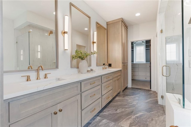 10675 W 142nd Ter, Overland Park, KS 66221 - full bathroom featuring double vanity, a marble finish shower, marble tiled flooring, and recessed lighting