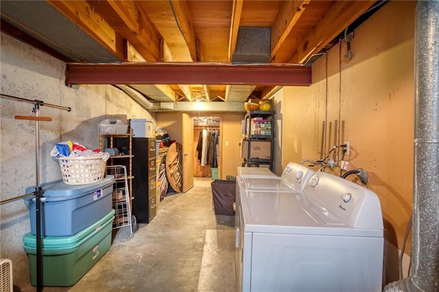 unfinished below grade area with washer and dryer