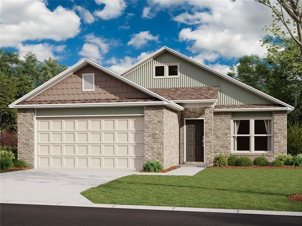 craftsman inspired home featuring an attached garage, a front yard, driveway, and brick siding