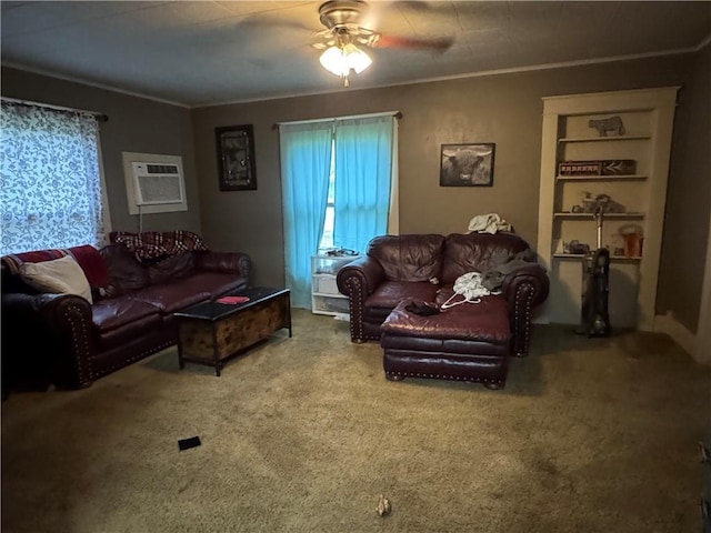 living area featuring crown molding, ceiling fan, a wall mounted AC, and carpet floors