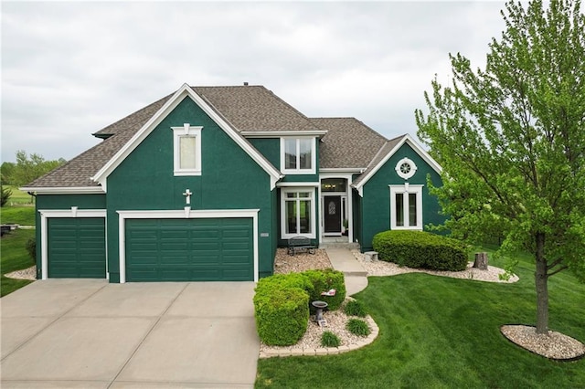craftsman-style house featuring a garage, a front yard, stucco siding, a shingled roof, and driveway