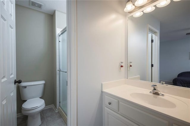 bathroom with visible vents, tile patterned flooring, vanity, toilet, and a stall shower