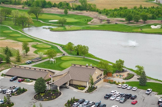 aerial view with a water view and golf course view