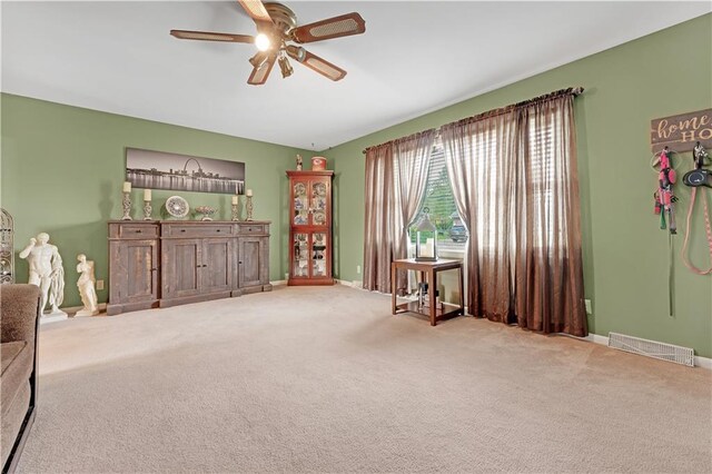 1003 Leone Ave, Sedalia, MO 65301 - sitting room featuring a ceiling fan, baseboards, visible vents, and carpet