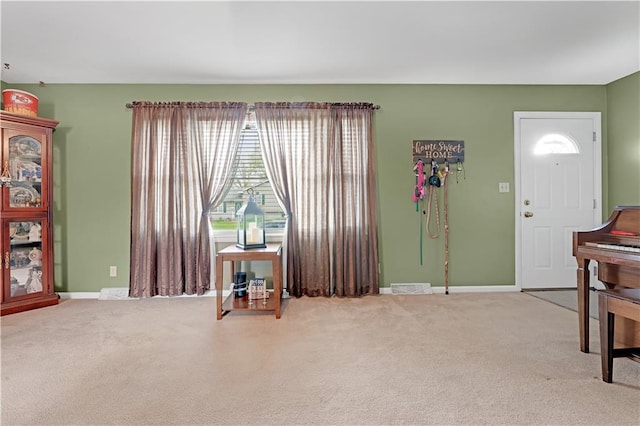 1003 Leone Ave, Sedalia, MO 65301 - interior space with baseboards, carpet flooring, and visible vents