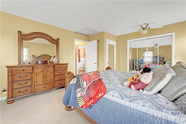 1003 Leone Ave, Sedalia, MO 65301 - bedroom with a closet, a ceiling fan, ensuite bath, and light carpet