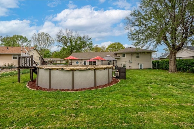 1003 Leone Ave, Sedalia, MO 65301 - view of yard with a gazebo, a covered pool, and a deck