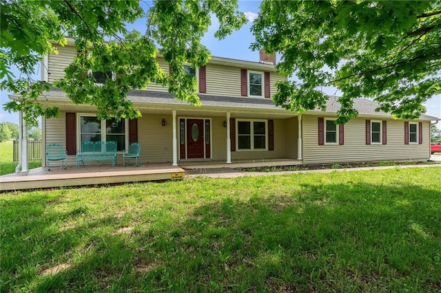 19707 E State Route A, Archie, MO 64725 - view of front facade with a chimney, covered porch, and a front yard