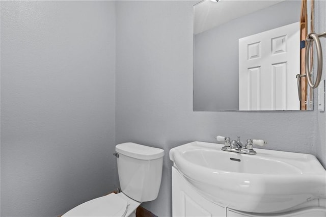 19707 E State Route A, Archie, MO 64725 - half bath featuring vanity and toilet