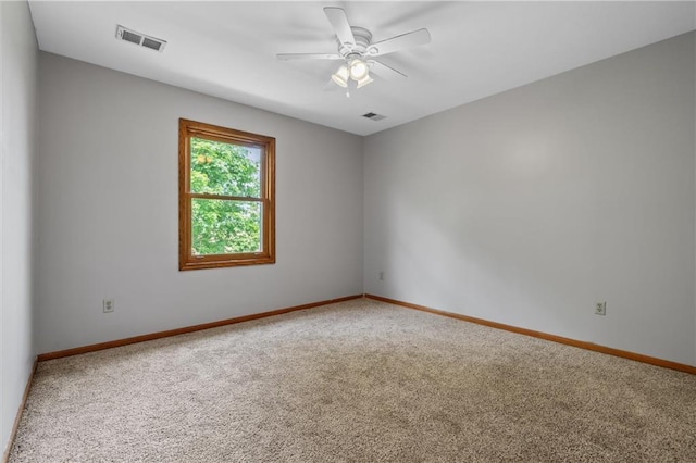 19707 E State Route A, Archie, MO 64725 - unfurnished room with carpet floors, baseboards, and a ceiling fan