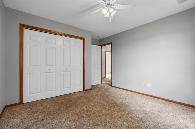 19707 E State Route A, Archie, MO 64725 - unfurnished bedroom with carpet flooring, baseboards, and a closet