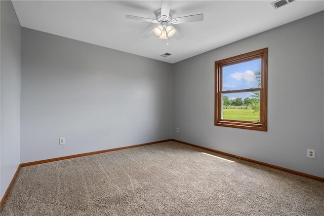 19707 E State Route A, Archie, MO 64725 - unfurnished room featuring carpet flooring, baseboards, and a ceiling fan