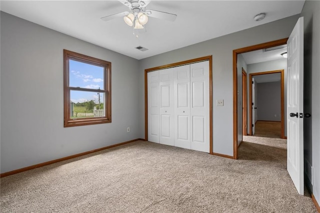 19707 E State Route A, Archie, MO 64725 - unfurnished bedroom featuring carpet, baseboards, and a closet