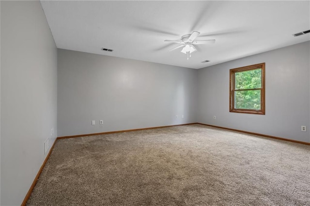 19707 E State Route A, Archie, MO 64725 - spare room with carpet flooring, ceiling fan, and baseboards