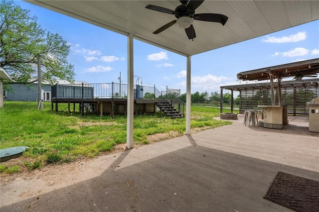 19707 E State Route A, Archie, MO 64725 - view of patio with stairway, a wooden deck, and a ceiling fan