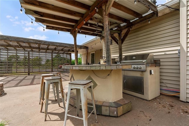 19707 E State Route A, Archie, MO 64725 - view of patio / terrace with a bar