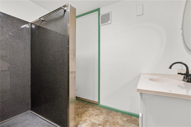 19707 E State Route A, Archie, MO 64725 - full bathroom with vanity, a shower, and baseboards