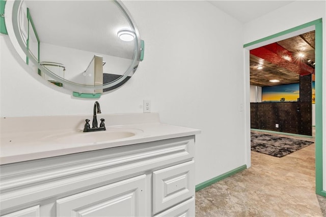 19707 E State Route A, Archie, MO 64725 - bathroom featuring vanity and baseboards