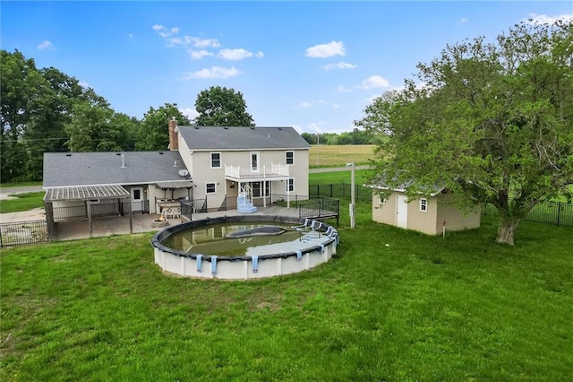 19707 E State Route A, Archie, MO 64725 - back of house with a jacuzzi and a chimney