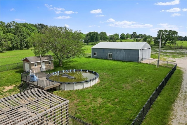 19707 E State Route A, Archie, MO 64725 - view of yard featuring an outdoor structure, an outbuilding, and view of scattered trees