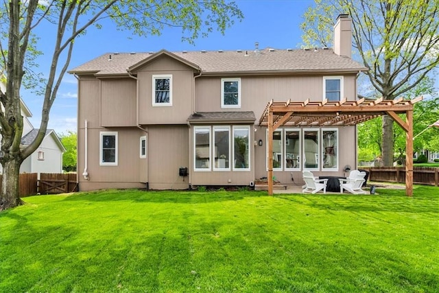 rear view of house featuring a chimney, a patio area, a fenced backyard, a yard, and a pergola