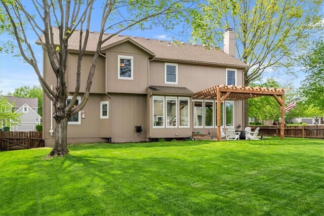 rear view of house featuring a chimney, roof with shingles, a lawn, a fenced backyard, and a pergola