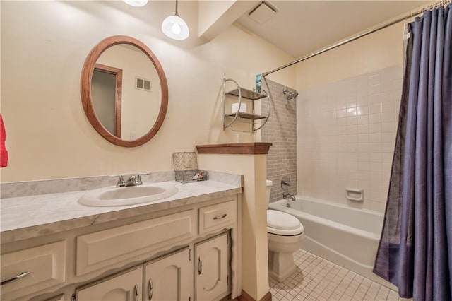 full bath featuring tile patterned floors, vanity, toilet, and shower / bath combo