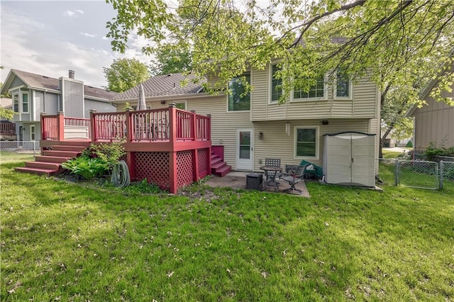 rear view of house featuring a deck, a patio, stairway, central AC, and a shed