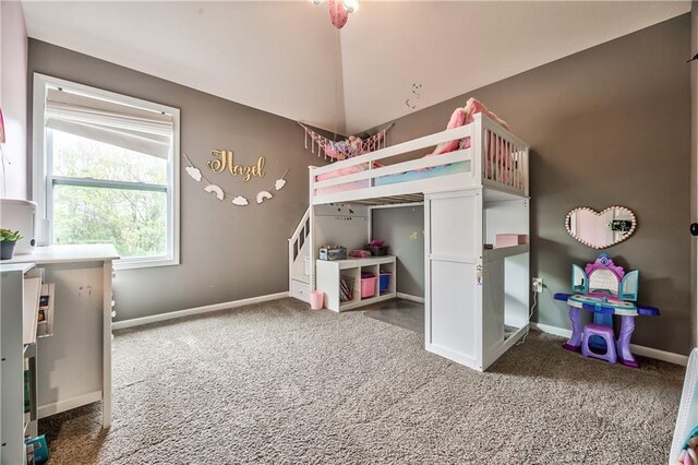 carpeted bedroom with baseboards