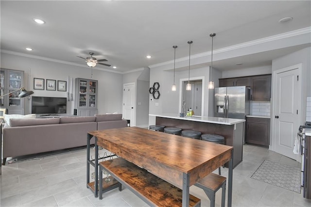 16223 Moon Shot St, Parkville, MO 64152 - dining room featuring crown molding, recessed lighting, a ceiling fan, and light tile patterned floors