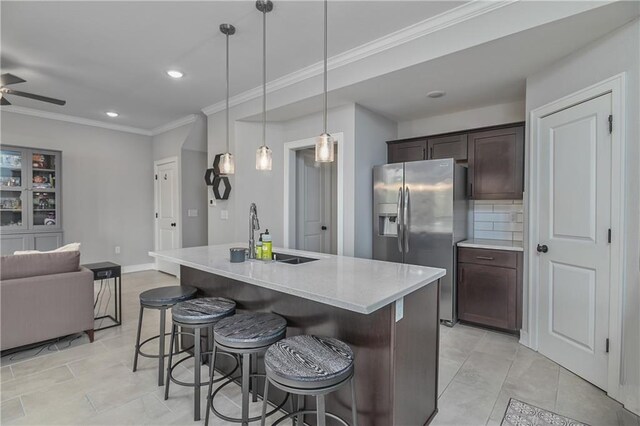 16223 Moon Shot St, Parkville, MO 64152 - kitchen with stainless steel refrigerator with ice dispenser, recessed lighting, a sink, and dark brown cabinets