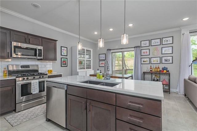 16223 Moon Shot St, Parkville, MO 64152 - kitchen featuring appliances with stainless steel finishes, dark brown cabinets, a sink, ornamental molding, and light tile patterned flooring
