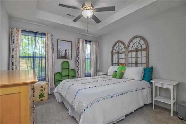 16223 Moon Shot St, Parkville, MO 64152 - bedroom featuring a ceiling fan, carpet, a tray ceiling, and visible vents