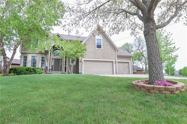 17065 W 162nd St, Olathe, KS 66062 - traditional-style home with a garage, driveway, a front lawn, and stucco siding
