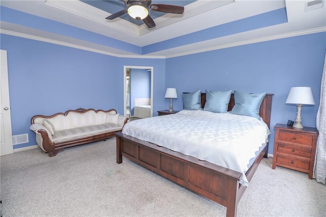 17065 W 162nd St, Olathe, KS 66062 - carpeted bedroom with visible vents, a ceiling fan, and a tray ceiling