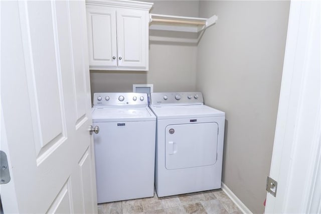 17065 W 162nd St, Olathe, KS 66062 - clothes washing area with cabinet space and separate washer and dryer