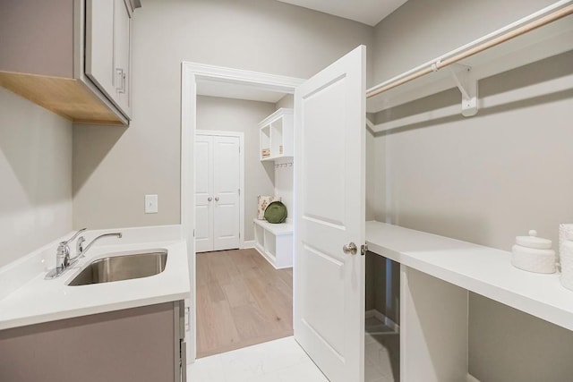 laundry room with a sink