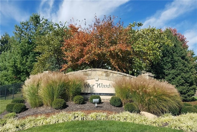community sign with fence