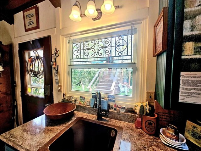 kitchen featuring a sink and a healthy amount of sunlight