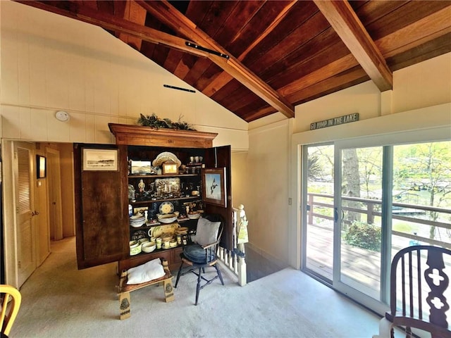 carpeted office space featuring wooden ceiling, beamed ceiling, and high vaulted ceiling