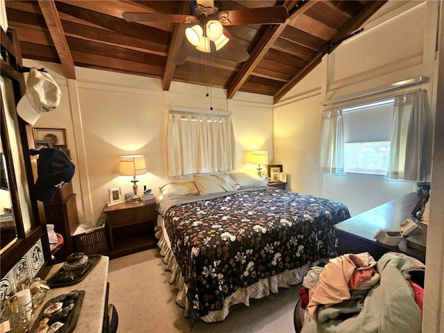 carpeted bedroom with lofted ceiling with beams and wooden ceiling