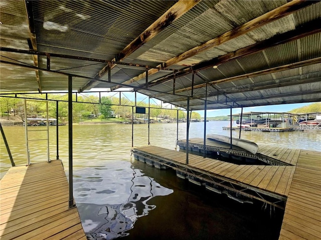 dock area featuring a water view
