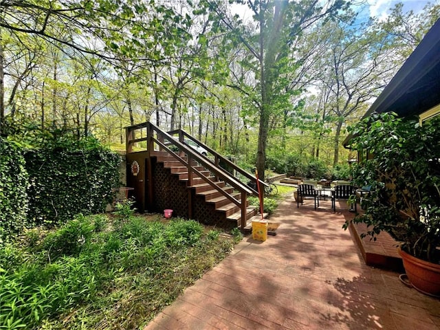 surrounding community featuring stairway